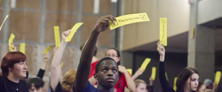 Students vote in the SSMU General Assembly. (Sam Reynolds / McGill Tribune)