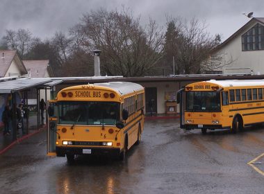 School bus pulling up to school